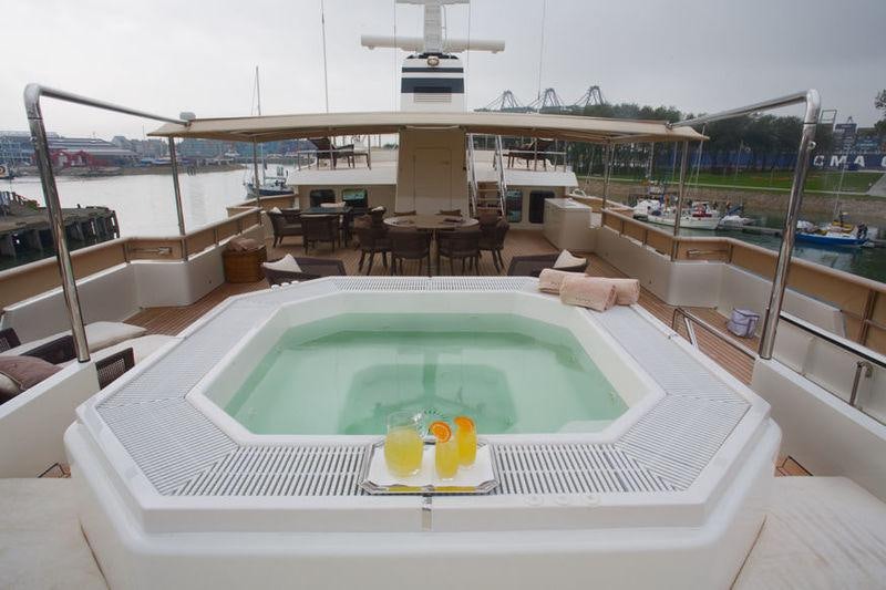 a swimming pool on a deck aboard PIONEER Yacht for Charter