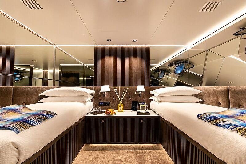 a room with two beds aboard CLOUD ATLAS Yacht for Charter