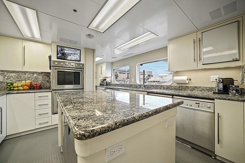 a kitchen with a marble counter top aboard ARTEMIS Yacht for Charter