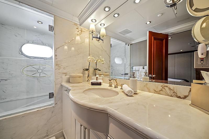 a bathroom with a large mirror aboard ARTEMIS Yacht for Charter