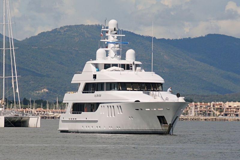 a large white boat in the water aboard MY LITTLE VIOLET Yacht for Charter