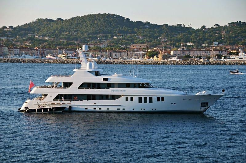 a large white yacht in the water aboard MY LITTLE VIOLET Yacht for Charter