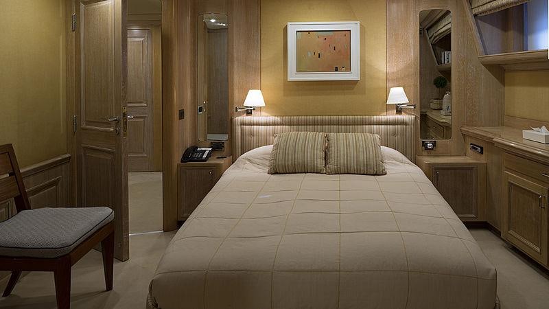 a bed in a hotel room aboard GOLDEN EAGLE Yacht for Charter