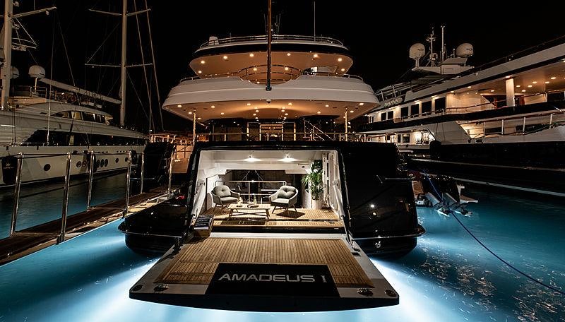 a boat docked at a pier aboard AMADEUS I Yacht for Charter