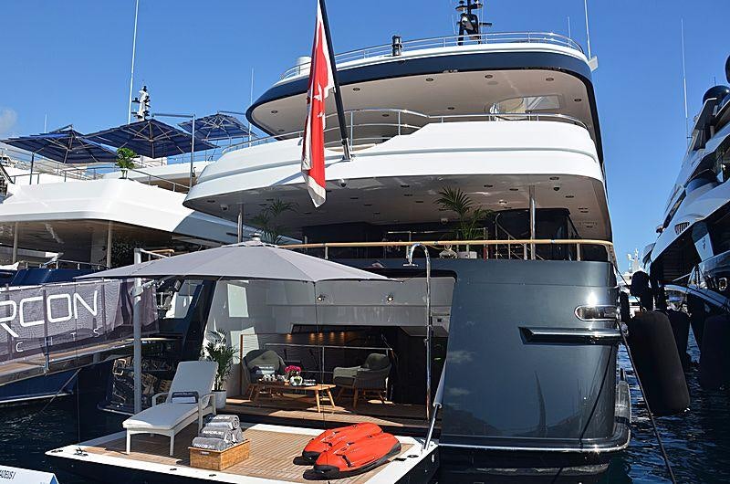 a boat docked at a pier aboard AMADEUS I Yacht for Charter
