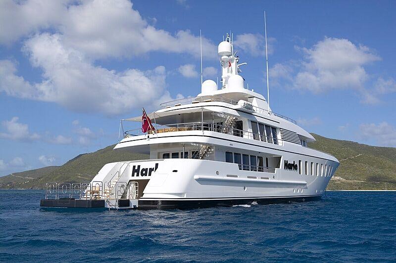 a white boat on the water aboard HARLE Yacht for Charter