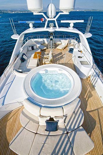 a swimming pool on a deck aboard KIJO Yacht for Charter