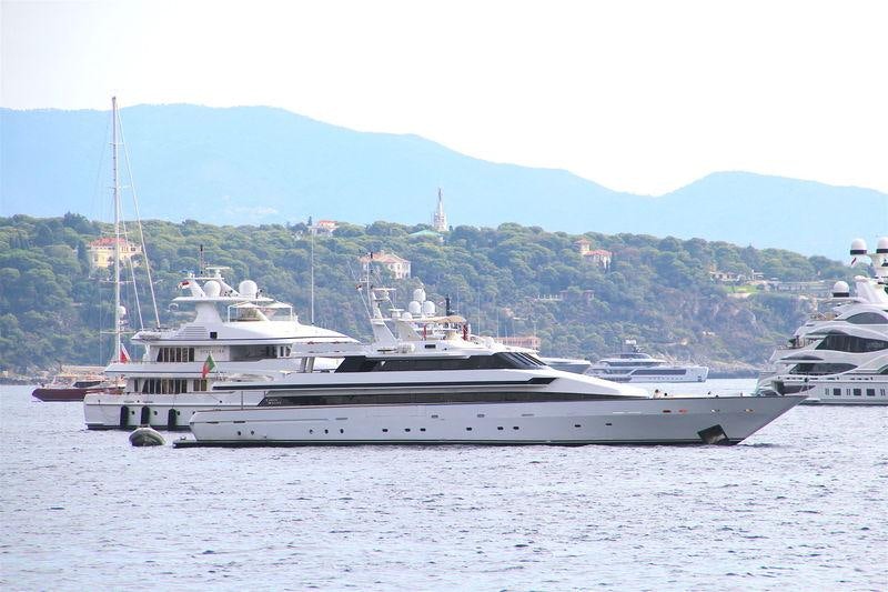a group of boats in a harbor aboard COSTA MAGNA Yacht for Charter