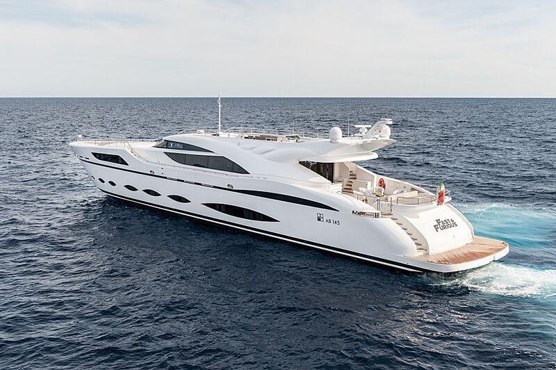 a white yacht in the water aboard FAST & FURIOUS Yacht for Charter