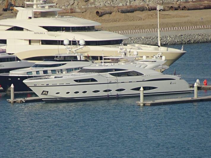 a large white yacht aboard FAST & FURIOUS Yacht for Charter