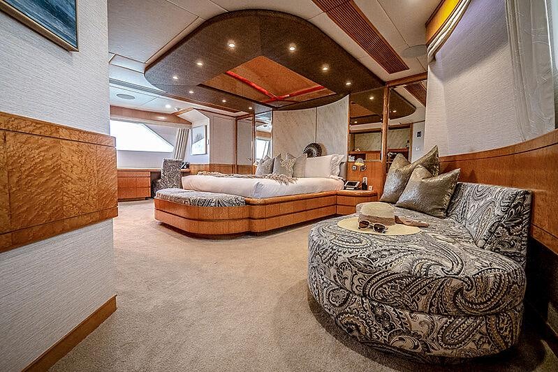 a living room with a couch and a large ceiling aboard ISLAND HEIRESS Yacht for Charter
