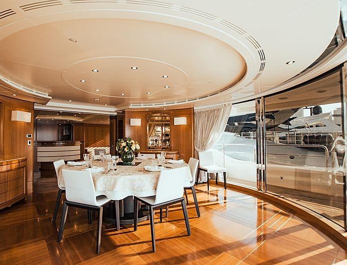 a large dining room with a table aboard ALEGRIA Yacht for Charter