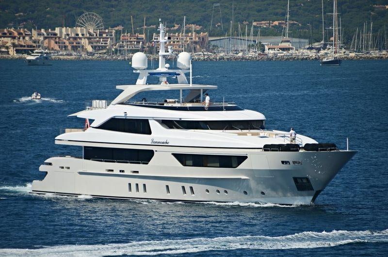 a white yacht on the water aboard LAMMOUCHE Yacht for Charter