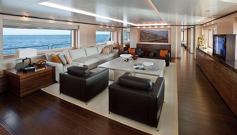 a living room with a large window aboard LAMMOUCHE Yacht for Charter