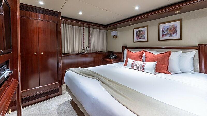 a bed in a room aboard STARSHIP Yacht for Charter