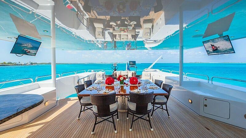 a table on a boat aboard STARSHIP Yacht for Charter