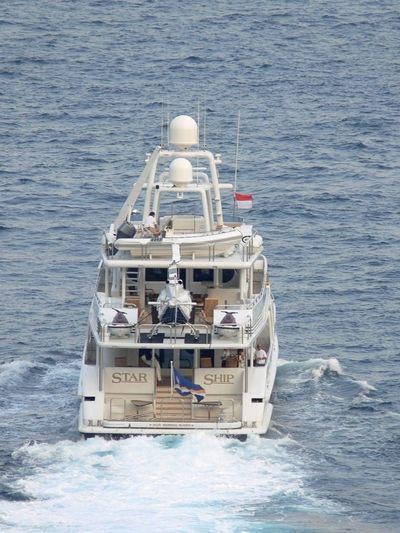 a boat in the water aboard STARSHIP Yacht for Charter