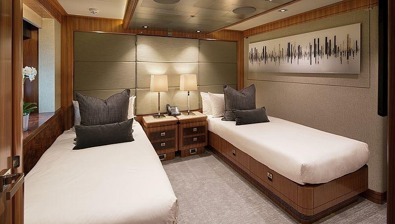 a room with two beds aboard MUCHOS MAS Yacht for Charter
