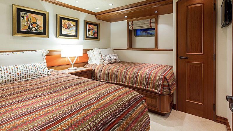 a couple of beds in a hotel room aboard CROSSED SABRE Yacht for Charter