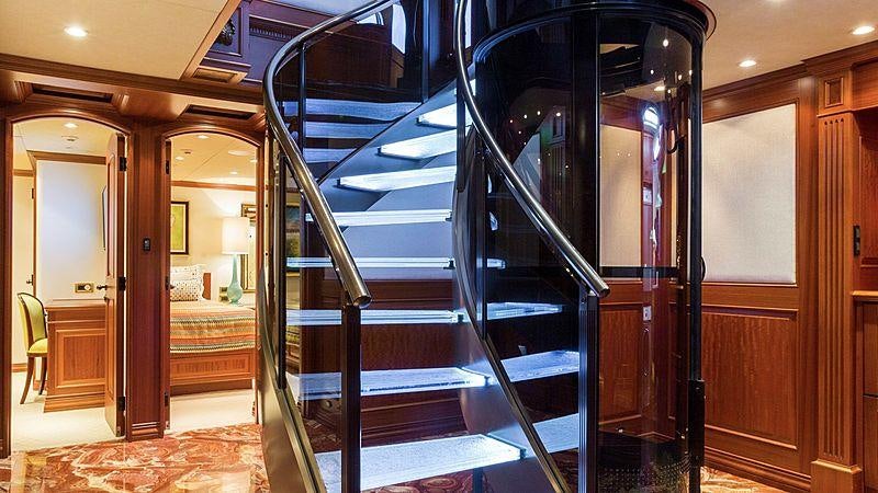 a set of stairs in a building aboard CROSSED SABRE Yacht for Charter