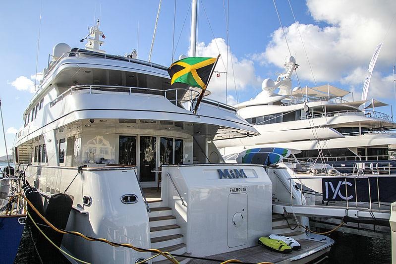 a boat docked at a pier aboard CROSSED SABRE Yacht for Charter