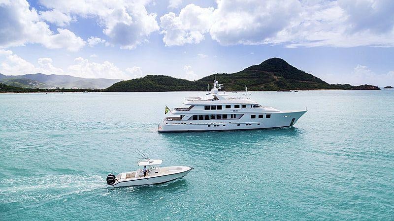 a couple of boats in the water aboard CROSSED SABRE Yacht for Charter