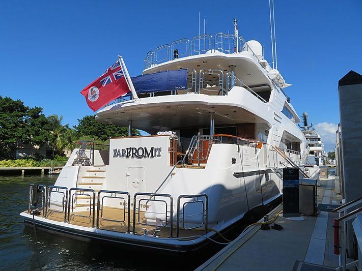 a large boat docked aboard FAR FROM IT Yacht for Charter