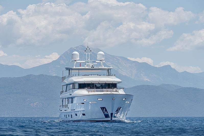 a large white ship in the water aboard SUNRISE Yacht for Charter