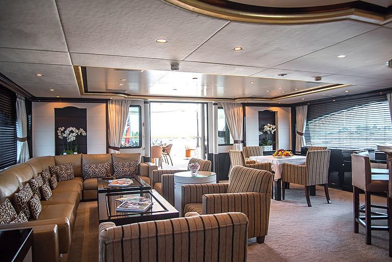 a living room with a couch and a table aboard DIANE Yacht for Charter