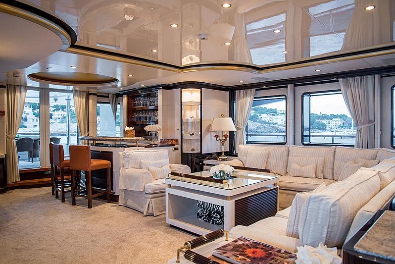 a living room with a large window aboard DIANE Yacht for Charter