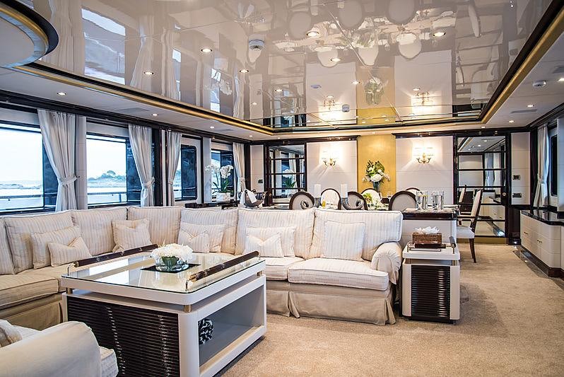 a living room with a large window aboard DIANE Yacht for Charter