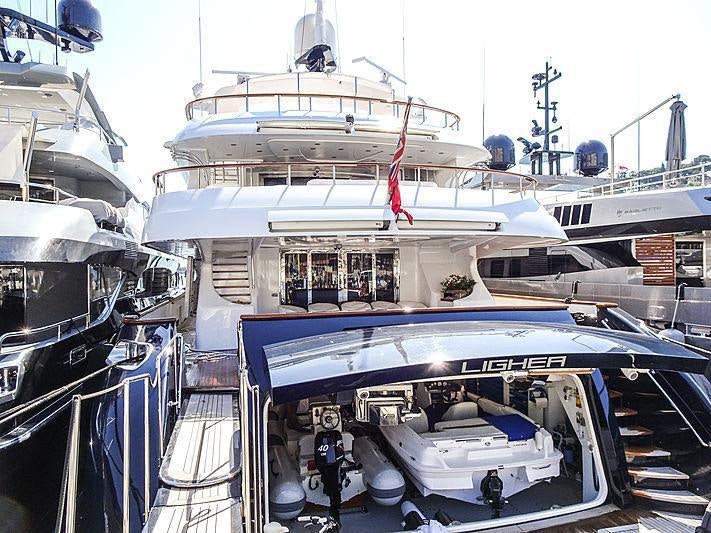 a large ship docked aboard HOLIDAY Yacht for Charter