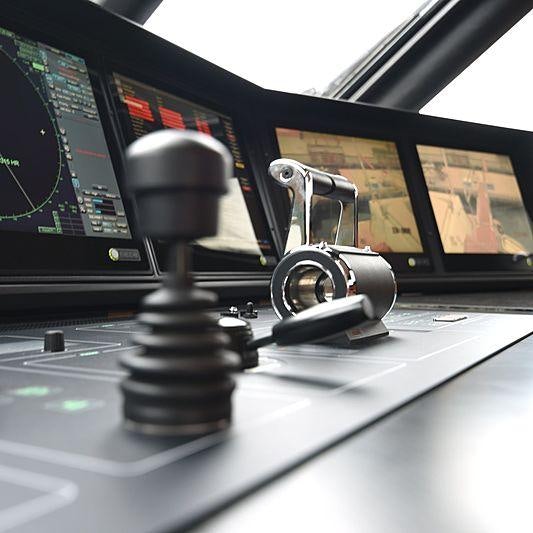 a black microphone on a white surface aboard LIFE SAGA Yacht for Charter