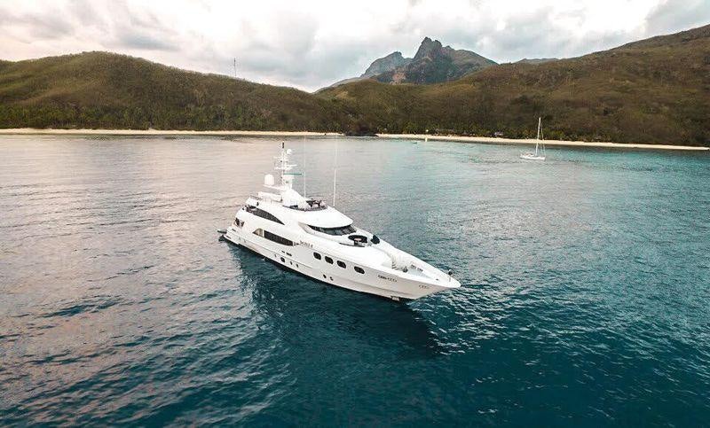 a white boat in the water aboard DE LISLE III Yacht for Charter