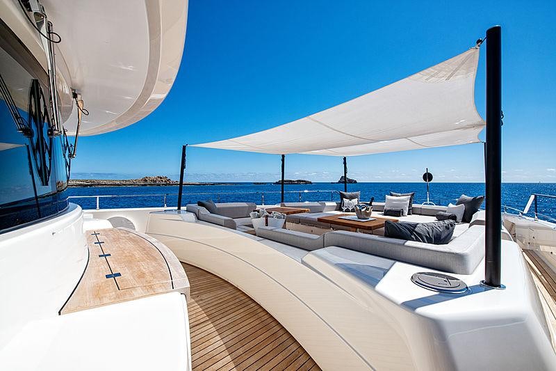 a room with a large bed and a large window aboard PALOMA Yacht for Charter