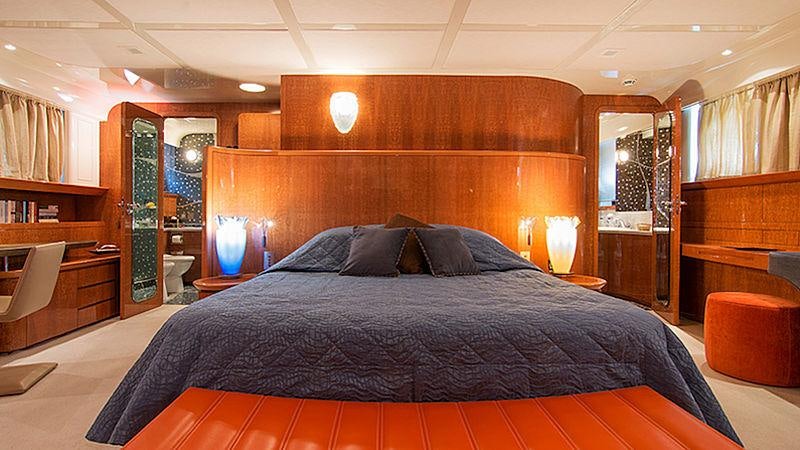 a large bed in a room aboard CONDOR A Yacht for Charter
