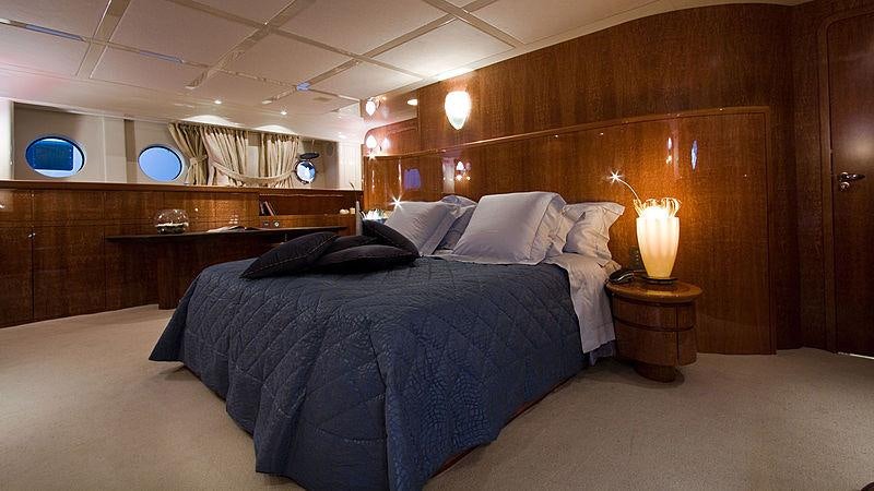 a large bed in a room aboard CONDOR A Yacht for Charter