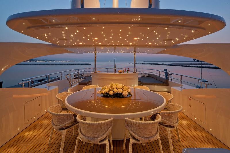 a table on a boat aboard AZIZA Yacht for Charter