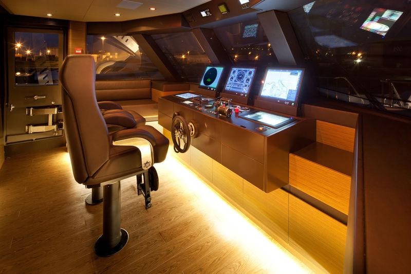 a chair in a bar aboard AZIZA Yacht for Charter