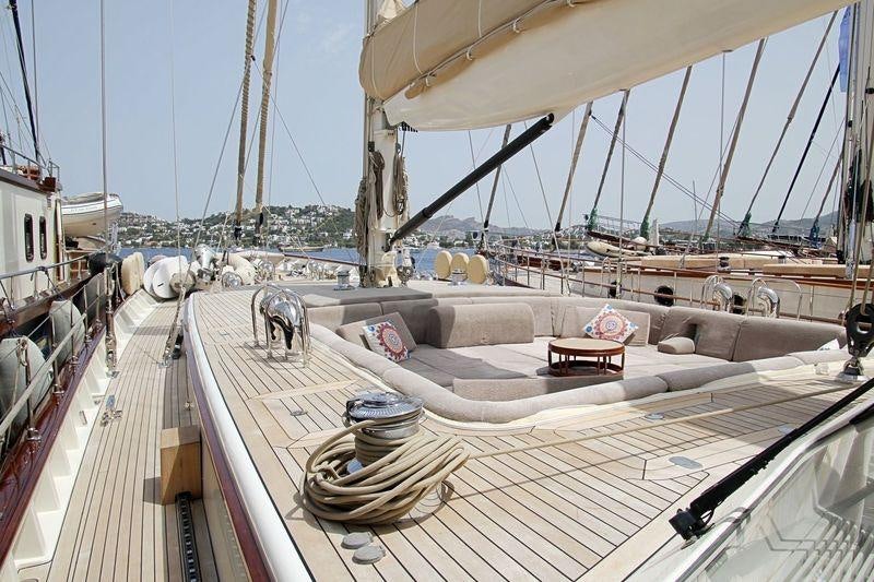 a deck with a deck and a view of a city aboard ZELDA Yacht for Charter