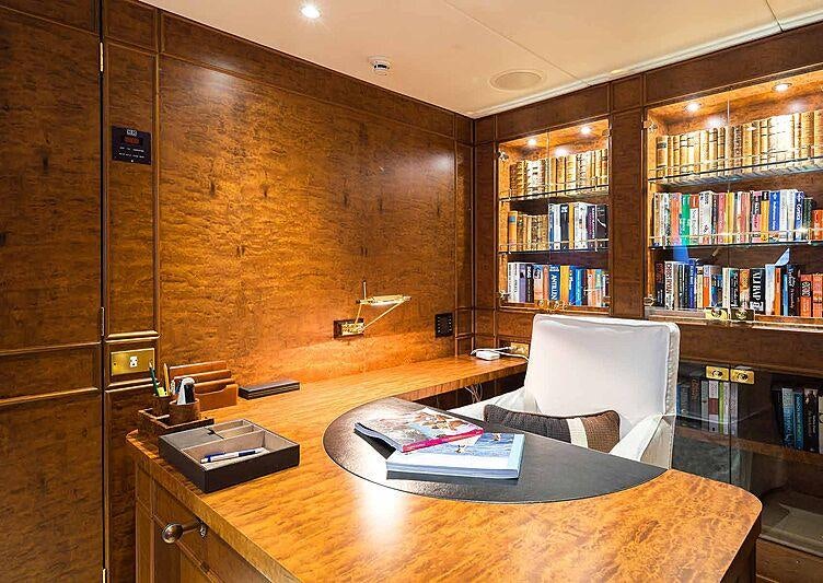 a room with a desk and a chair aboard BRAZIL Yacht for Charter