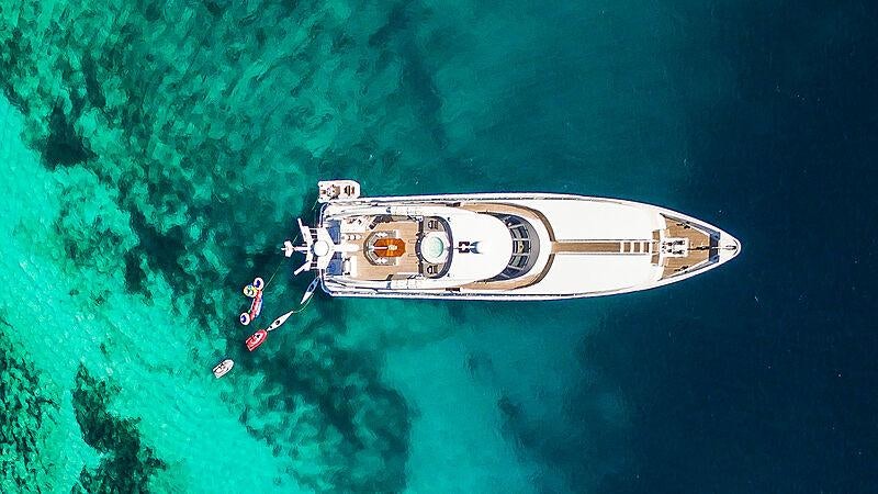 a white and red boat in the water aboard BRAZIL Yacht for Charter