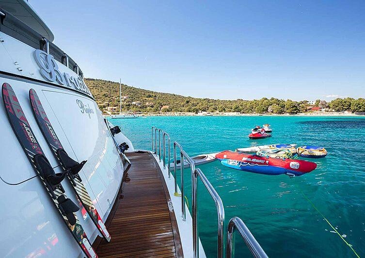 a group of boats on a body of water aboard BRAZIL Yacht for Charter