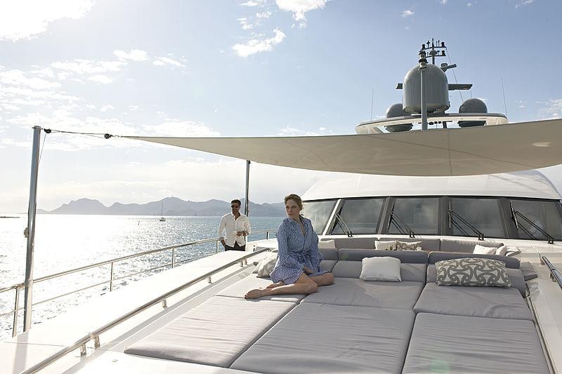 a person sitting on a boat aboard IMPERIAL PRINCESS BEATRICE Yacht for Charter