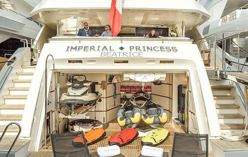 a large white vehicle with many bicycles on the front aboard IMPERIAL PRINCESS BEATRICE Yacht for Charter