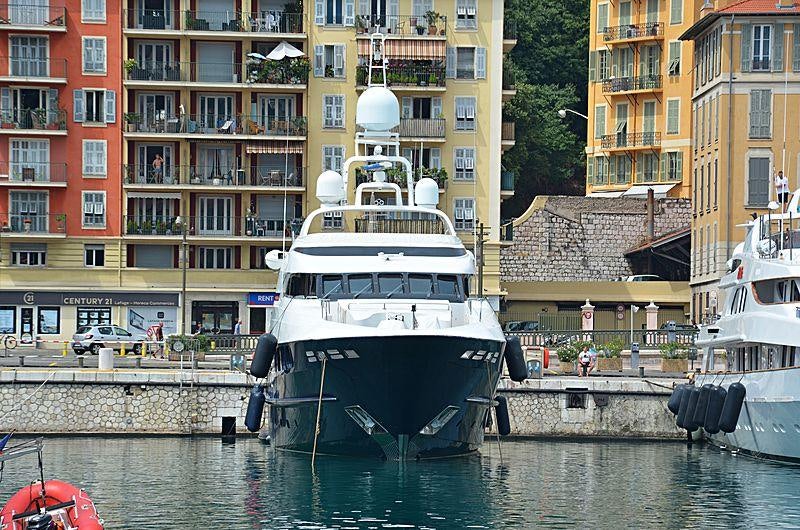 a boat docked in a harbor aboard MY WAY V Yacht for Charter