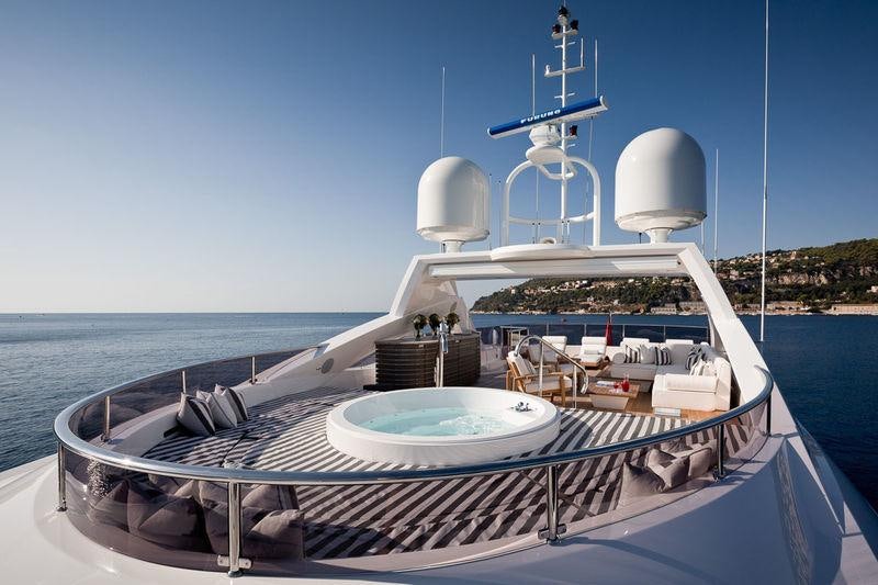 a boat with a satellite dish on it aboard THUMPER Yacht for Charter
