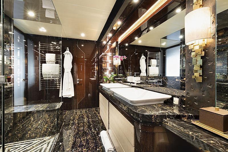 a bathroom with a large marble countertop aboard SONISHI Yacht for Charter