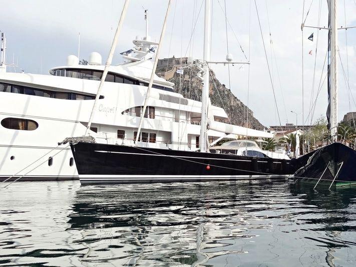 a group of boats in a harbor aboard ARISTARCHOS Yacht for Charter