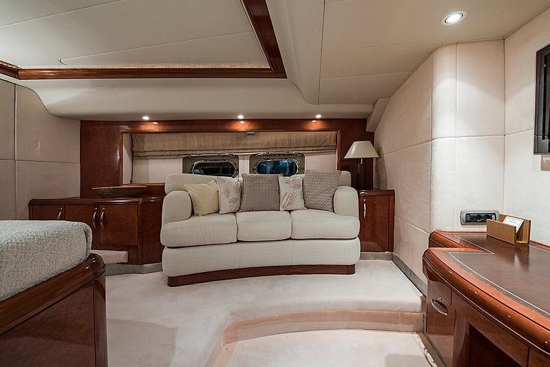 a large living room with a large bed aboard THANDEKA Yacht for Charter